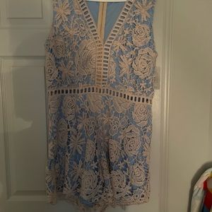 Blue dress covered with off white lace